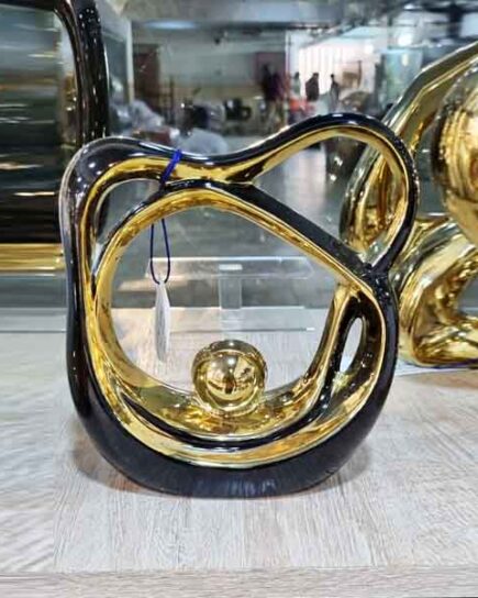 glossy black and golden Vase